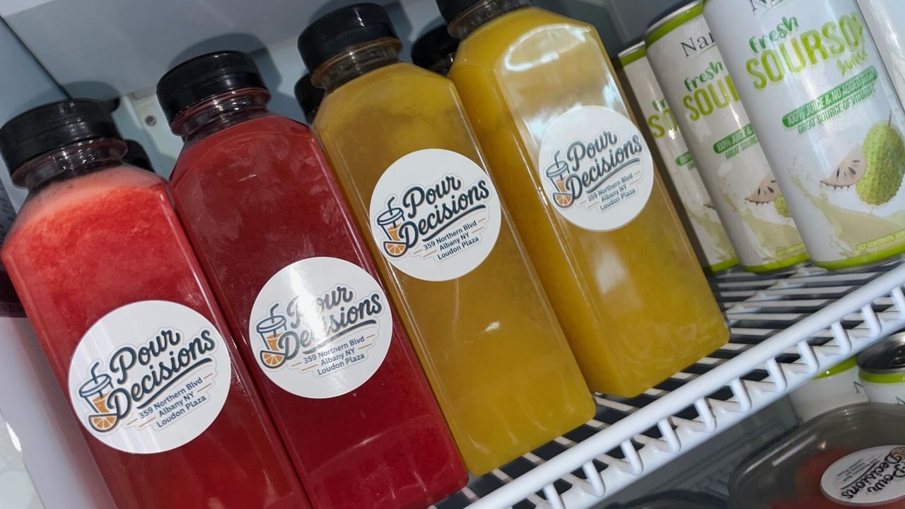 Cold-pressed juice bottles at Pour Decisions